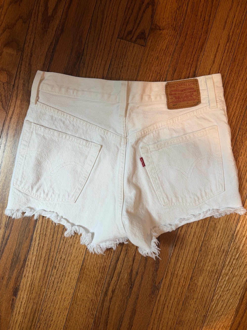 Women’s Distressed Levi's 501 vintage cut-off shorts, color: white. Size: 26